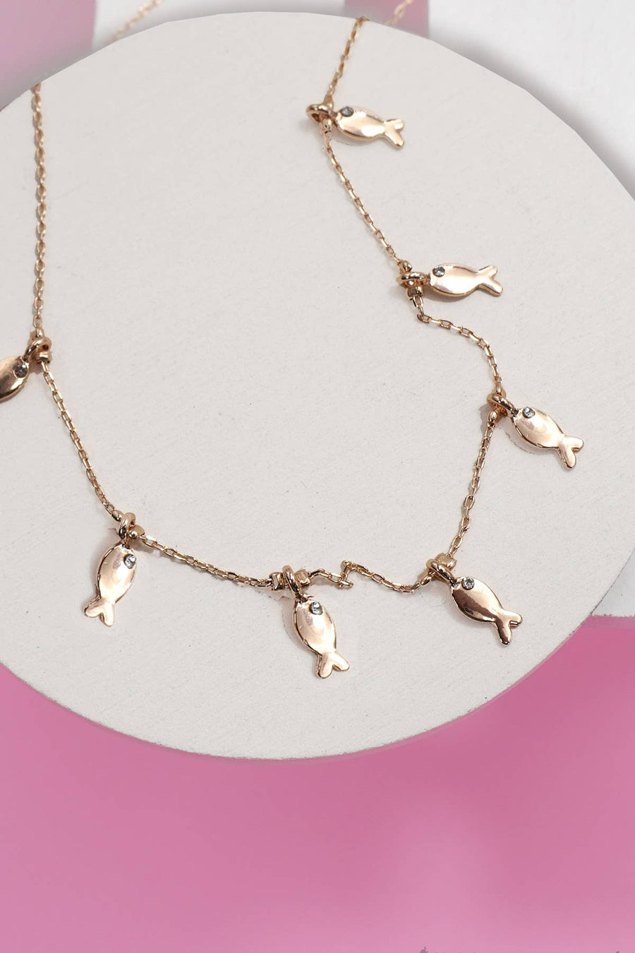 Delicate fish charm station necklace