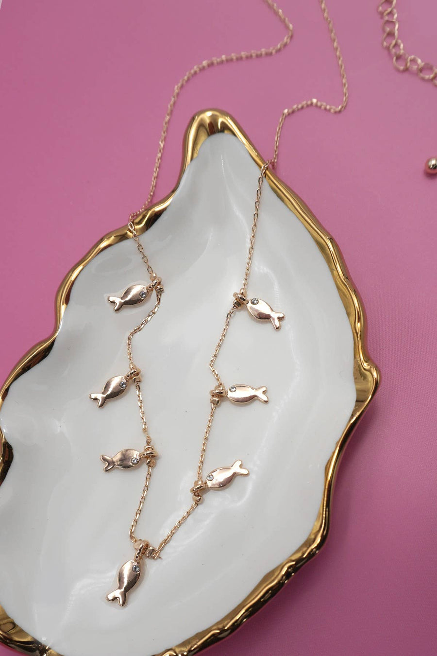Delicate fish charm station necklace